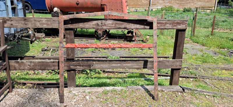 Bluey's Cab leaning against a fence
