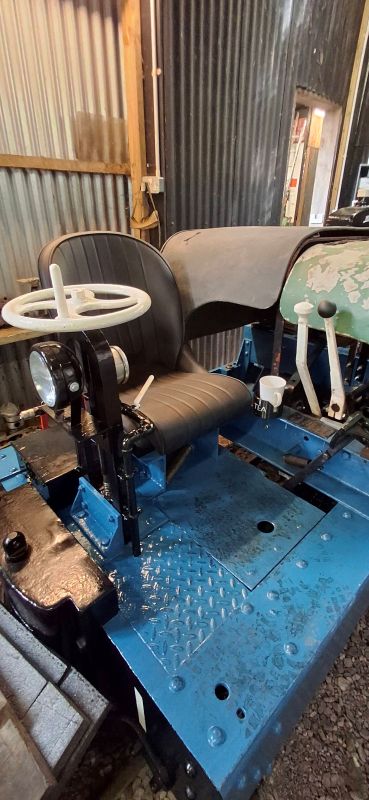 Bluey's new seat fixed in place next to its cab